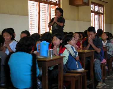 Child leading the prayer for the evening meal